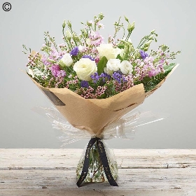 Hand tied bouquet made with the finest flowers