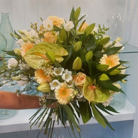 Hand tied bouquet made with the finest flowers.