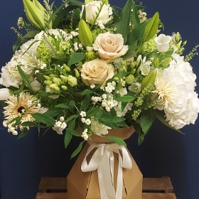 Hand tied bouquet made with the finest flowers.